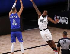 穆古鲁扎巅峰对决，东契奇与80激战G2分钟，挺进下一轮胜负难料！的简单介绍